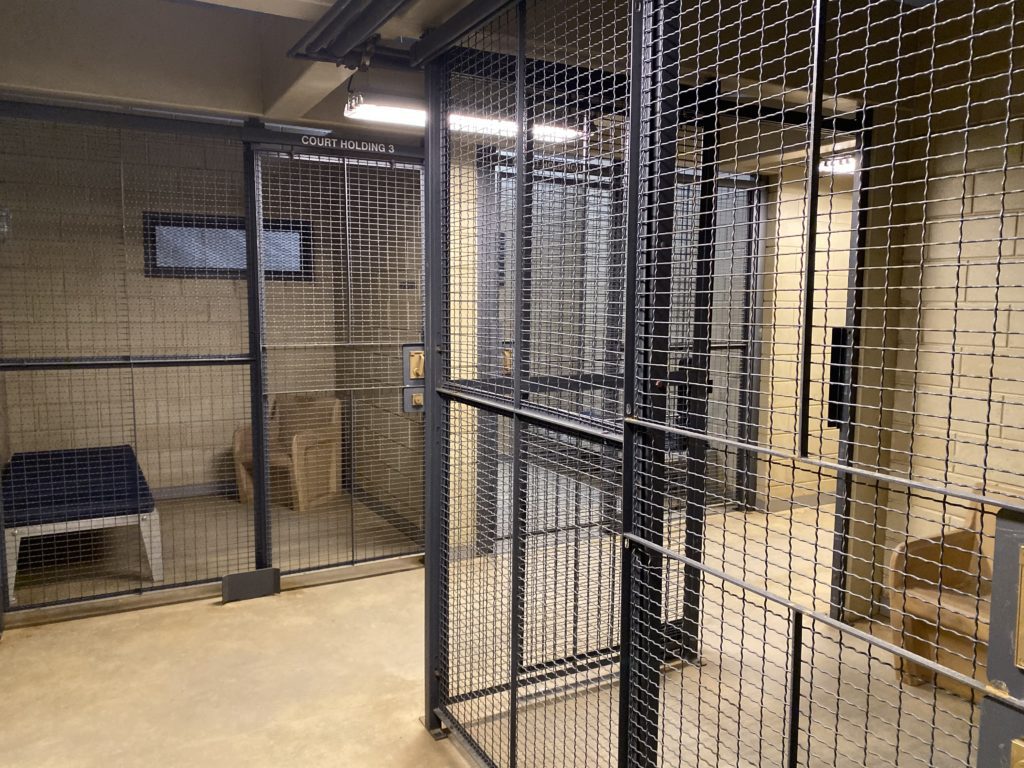 BCL-cage tv prison scene