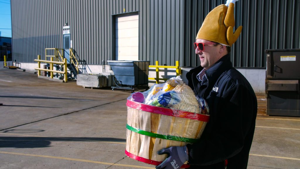 David Shearn carries basket