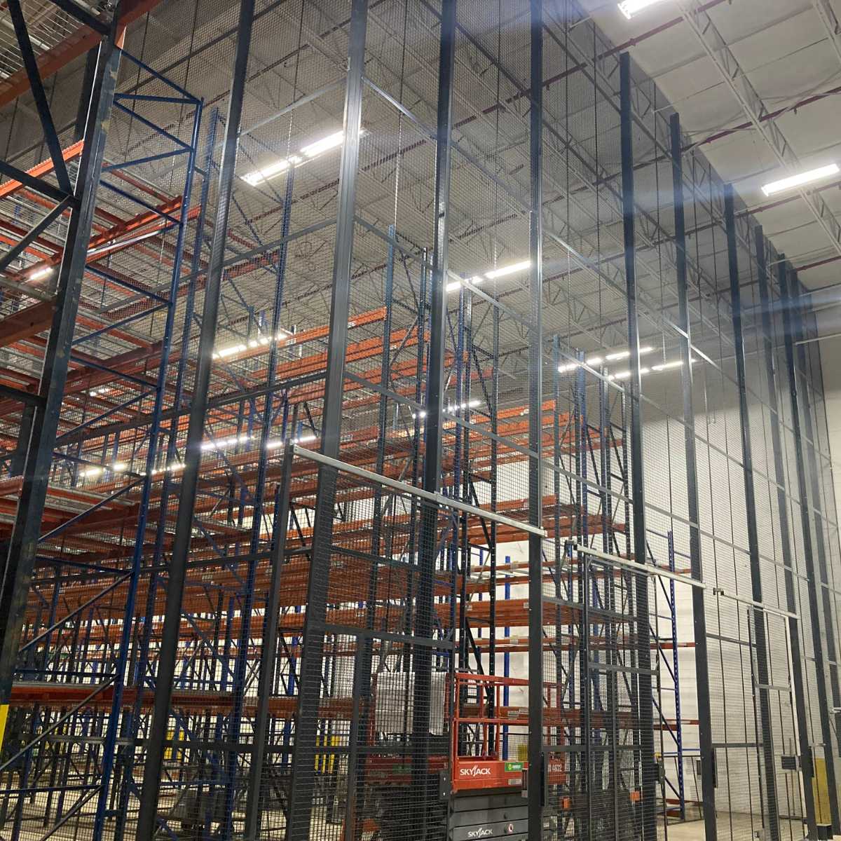 floor to ceiling black security cage