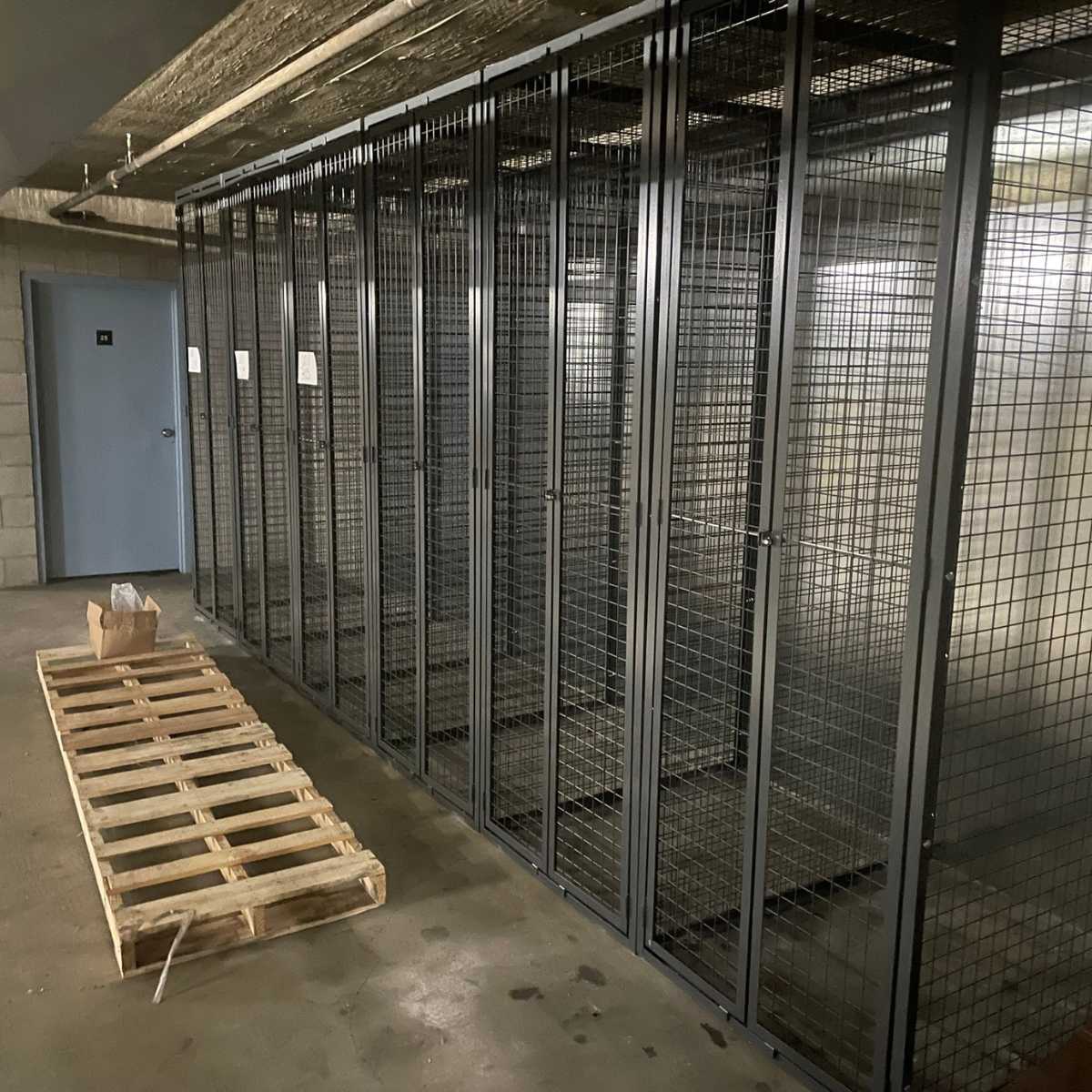 floor to ceiling storage lockers with solid back panel