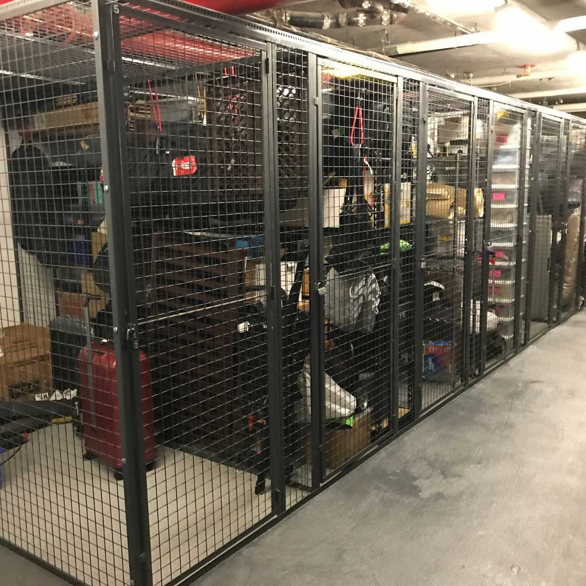 black wire mesh storage cages with individual doors