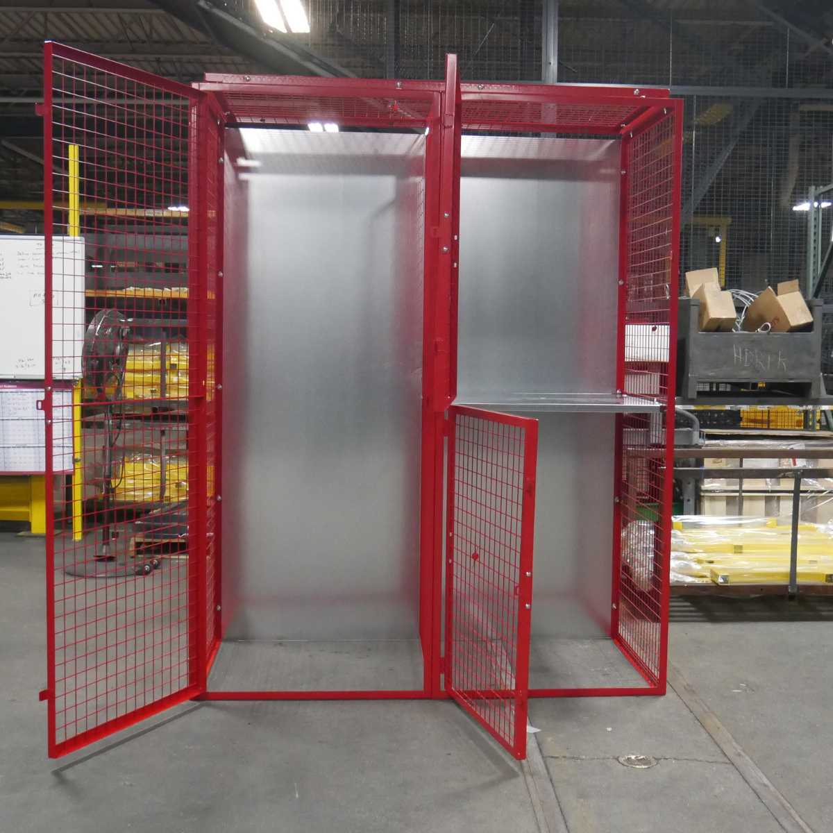 red wire mesh locker with solid back panel and open doors