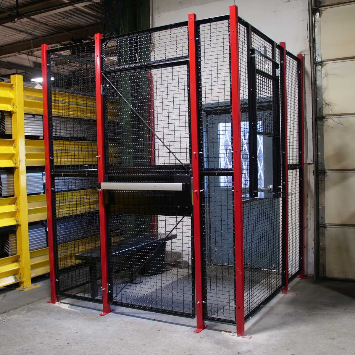 red and black three panel driver cage with security door