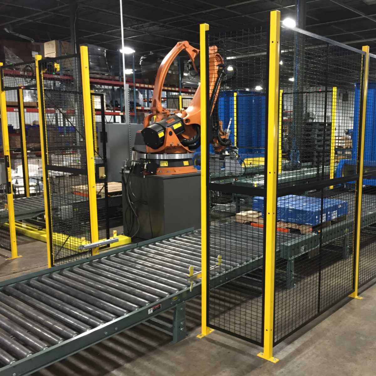 black and yellow wire mesh panels around machine